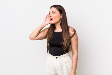 young pretty woman looking serious and curious, listening, trying to hear a secret conversation or...