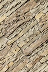Diagonal modern brown brick wall. Background close-up.