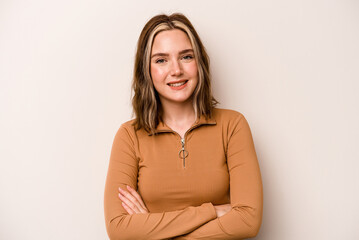 Obraz premium Young caucasian woman isolated on white background who feels confident, crossing arms with determination.