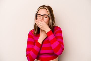 Young caucasian woman isolated on white background suffers pain in throat due a virus or infection.