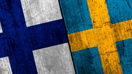 Flags of Finland and Sweden as a symbol of political relations.