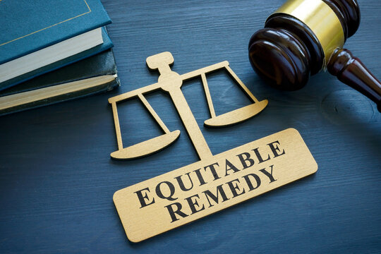 Plate with phrase Equitable remedy and a gavel.