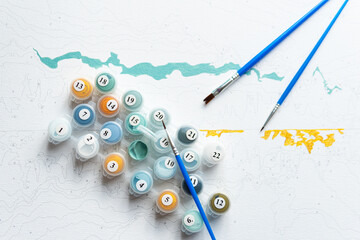 A set of colorful gouache for painting by numbers, drawing on canvas.