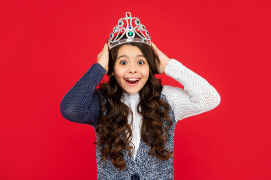 surprused child in queen crown. princess in tiara. portrait of proud kid. teen girl wear diadem
