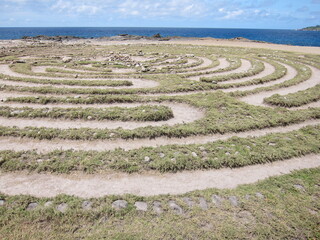 Dragon's teeth labyrinth at Makaluapuna Point, Kapalua, Maui, Hawaii. A circular labyrinth made of...