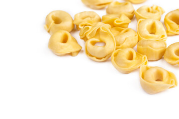 Raw fresh tortellini pasta isolated on white background