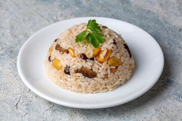 Traditional delicious Turkish food; rice pilaf with pine nuts and currants (Turkish name; bademli ic pilav or pilaf)
