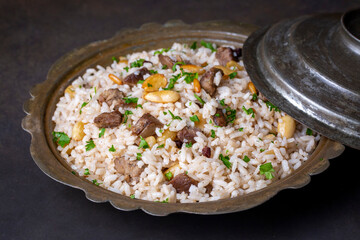 Traditional delicious Turkish food; rice pilaf with pine nuts and currants (Turkish name; bademli ic pilav or pilaf)