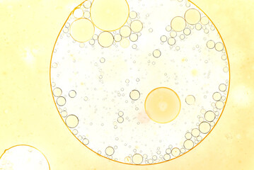 Drops of fat in water. Bubbles of fat close up