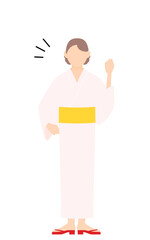 女性の浴衣姿、元気よくガッツポーズ