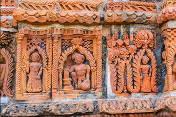 Terracotta art works on the temple walls of Lalji temple of Kalna, West Bengal, India - It is one of oldest temples of lord Krishna (a Hindu God). It is a famous artwork made of burnt bricks.