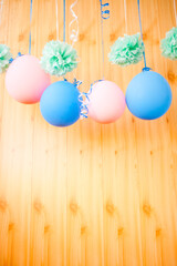 Beautiful background with blue and pink air balloons and green decorations, birthday and celebration vertical card