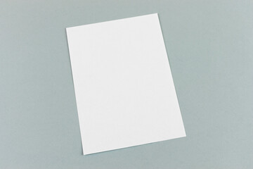 Mockup of white blank empty page for invitation, documents, card, branding on grey background