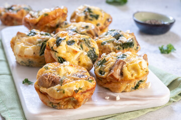 Vegetarian egg muffins with mushroom, green kale and feta cheese for Healthy keto diet Breakfast or lunch