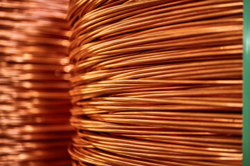 Shiny winded copper cable in warehouse of production plant