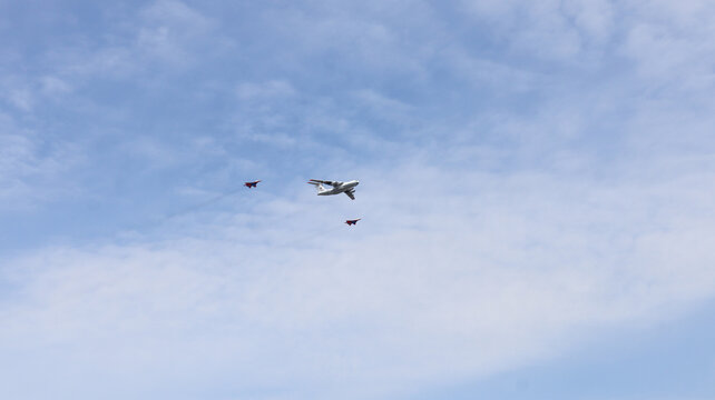 Moscow, Russia, May 2022: The IL-78 tanker aircraft. Accompanied by Mig-29 fighters. Aircrafts participating in the main rehearsal of military parade