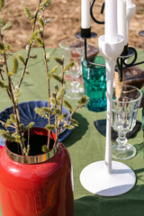a table set in nature at the dacha in spring for lunch or dinner