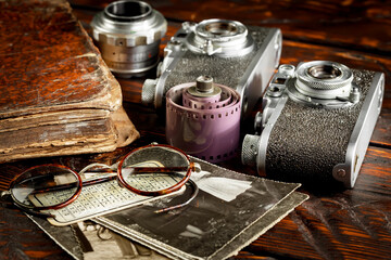 Old vintage cameras on an old background.