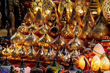 Electric luminous colorful mosaic lamps in oriental style as tourist souvenirs at night street market in Sharm El Sheikh, Egypt