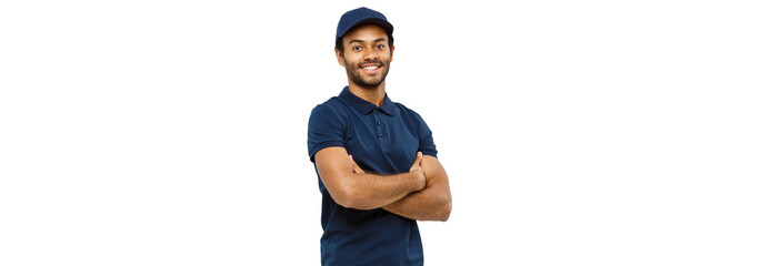 Delivery Concept - Handsome African American delivery man crossed arms over isolated on Grey studio...