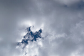 Atmospheric photo of white clouds against a blue sky background