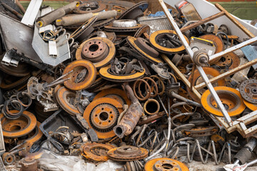 Rusty car parts. A pile of scrap metal. Background, texture
