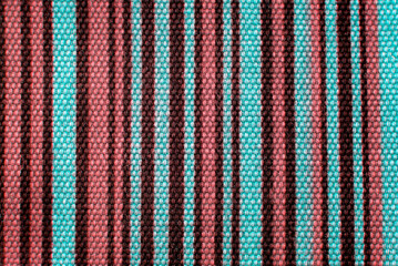 close up of the stripped blue cyan and red  fabric texture background