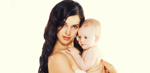 Portrait of happy mother holding cute baby on white background, blank copy space for advertising text