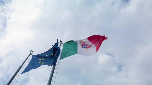 Flags waving in the wind Lake Como Italy