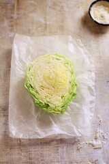 Raw cabbage on the table, rustic composition, vegetarian/vegan food, concept of healthy eating, healthy food.