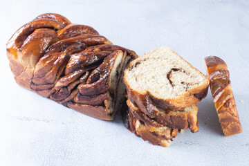 Chocolate Walnut Braid Bread, displayed on gray background