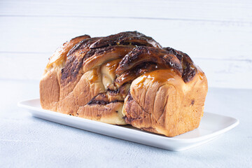 Chocolate Walnut Braid Bread, displayed on gray background