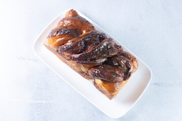Chocolate Walnut Braid Bread, displayed on gray background