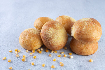 Corn and cheese bread, displayed on gray background