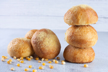 Corn and cheese bread, displayed on gray background