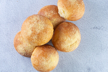 Corn and cheese bread, displayed on gray background