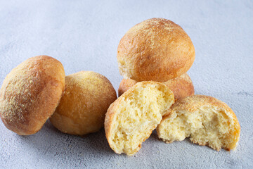 Corn and cheese bread, displayed on gray background