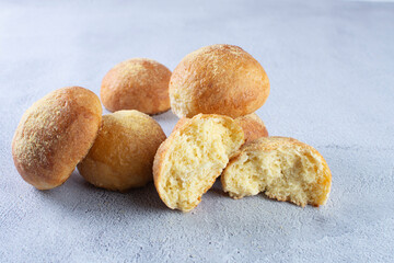 Corn and cheese bread, displayed on gray background