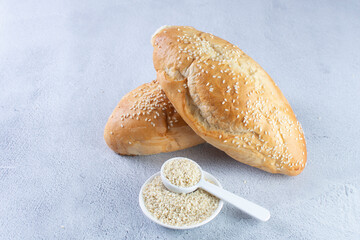 Traditional corn and sesame bread, displayed on gray background
