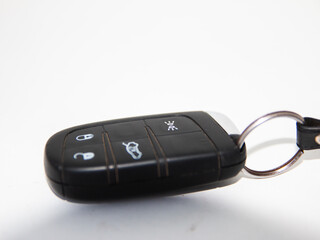 Black car keys isolated on white background
