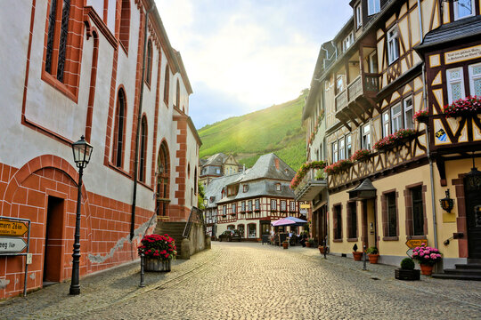 Beautiful street of half timbered buildings at dusk in the old town of Bacharach, Rhine region, Germany