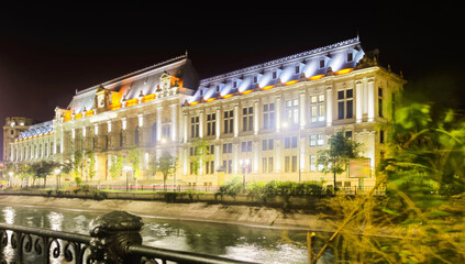 Palace of Justice in downtown Bucharest reflected in Dambovita River
