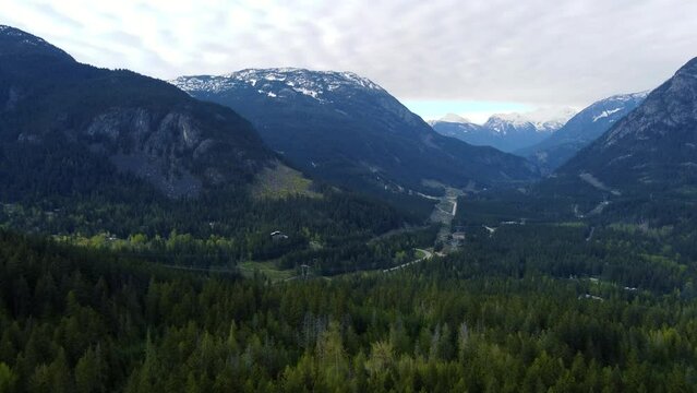 Aerial view of the long trop with coniferous forests between the cliffs