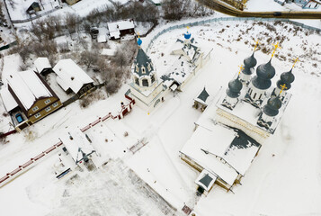 Winter aerial view of Orthodox Resurrection convent in snow covered Murom city in Vladimir Region,...