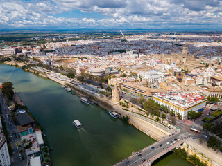 Fototapeta premium Aerial view Sevilla of city center with embankment of Guadalquivir. Spain