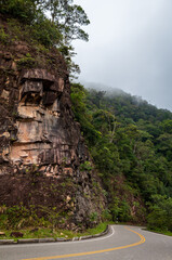 Rocky cliff near the highway with a view of the Peruvian Amazon.
