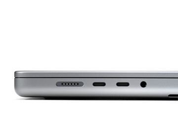 Space Grey Laptop Connector Ports, Magsafe, Thunderbolt 3, Headphone Jack, Side View Isolated on...