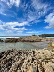 Rocky part of Medlands beach on Great Barrier Island, New Zealand. 
