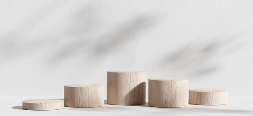 Wooden product display podium with shadow nature leaves on white background. 3D rendering	