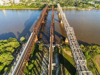 Drone view of the Memphis Arkansas Memorial Bridge,  Frisco Bridge and Harahan Bridge on Interstate 55 crossing the Mississippi River From Arkansas to Tennessee.